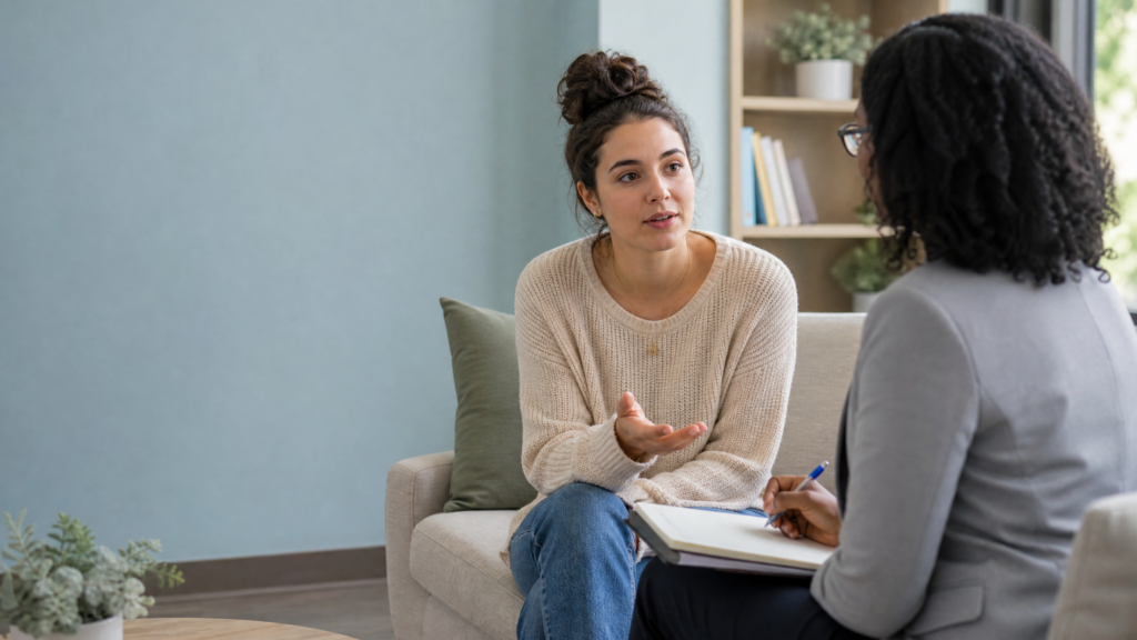 Marijuana and young women: young adult woman discussing mental health and informed choices with a healthcare professional during a clinical consultation.